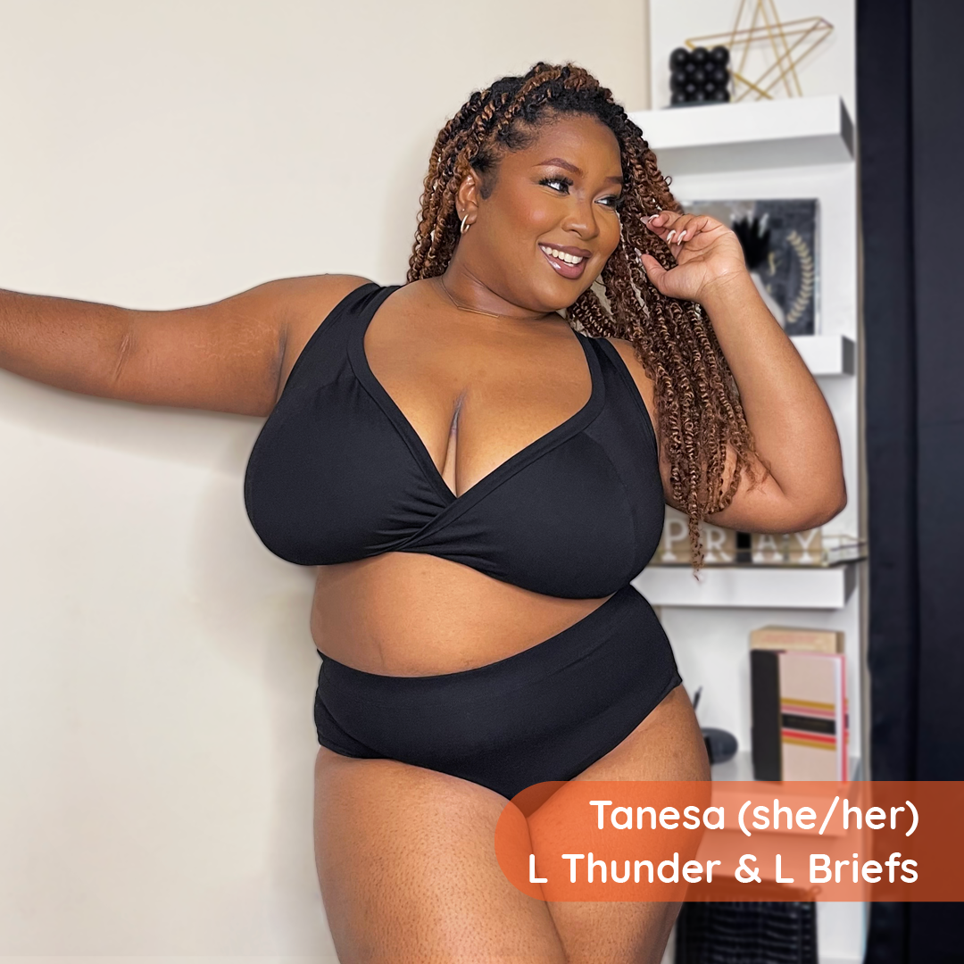 Tanesa is wearing a black non wired bra and high rise briefs