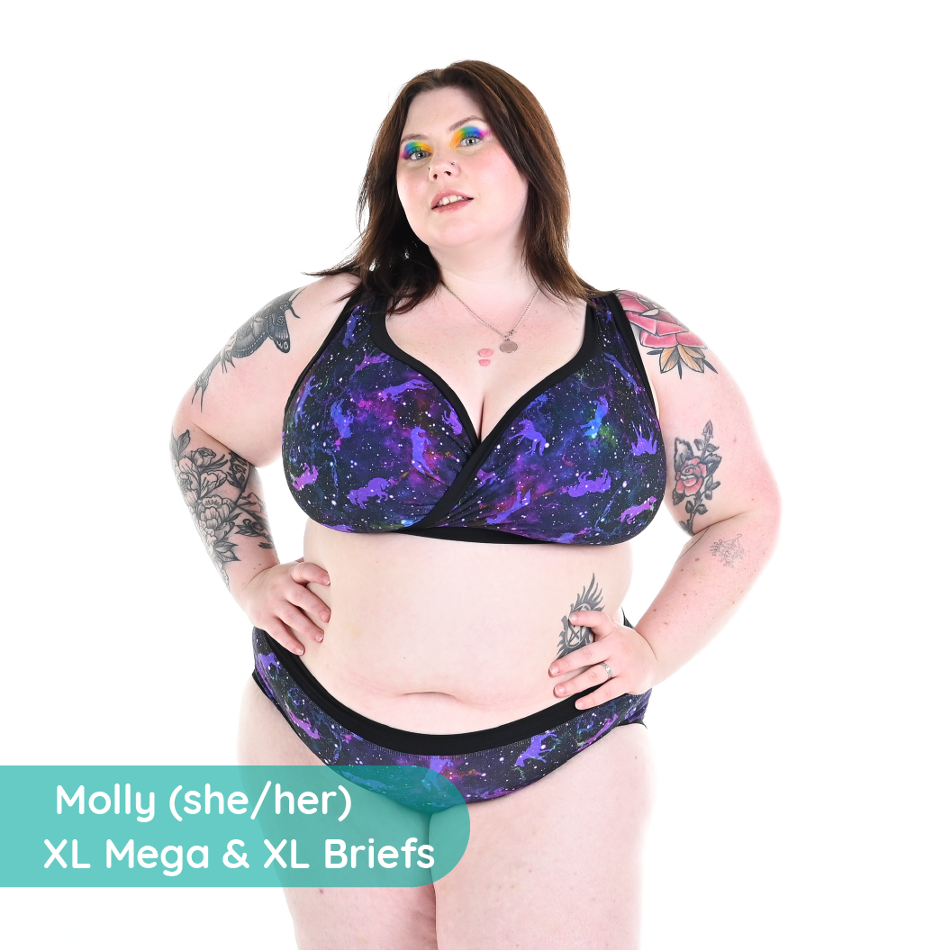 Molly is wearing a Universe underwear set with unicorns in space
