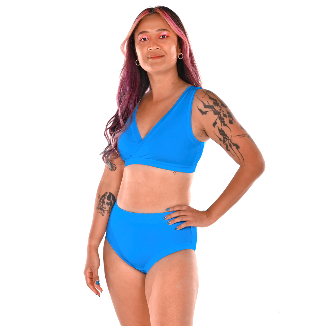 Sarah is wearing an aqua blue underwear set