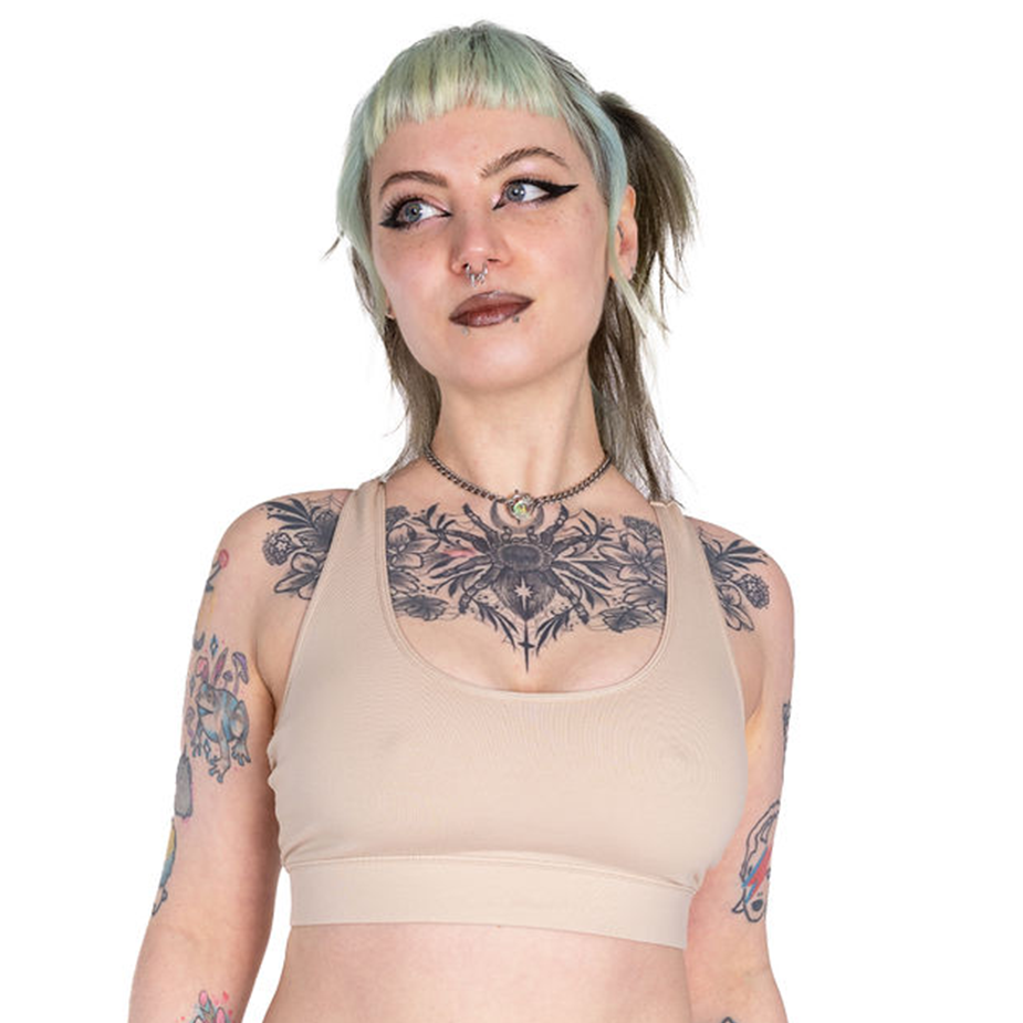 Faeryn is wearing a nude 3 racerback bralette