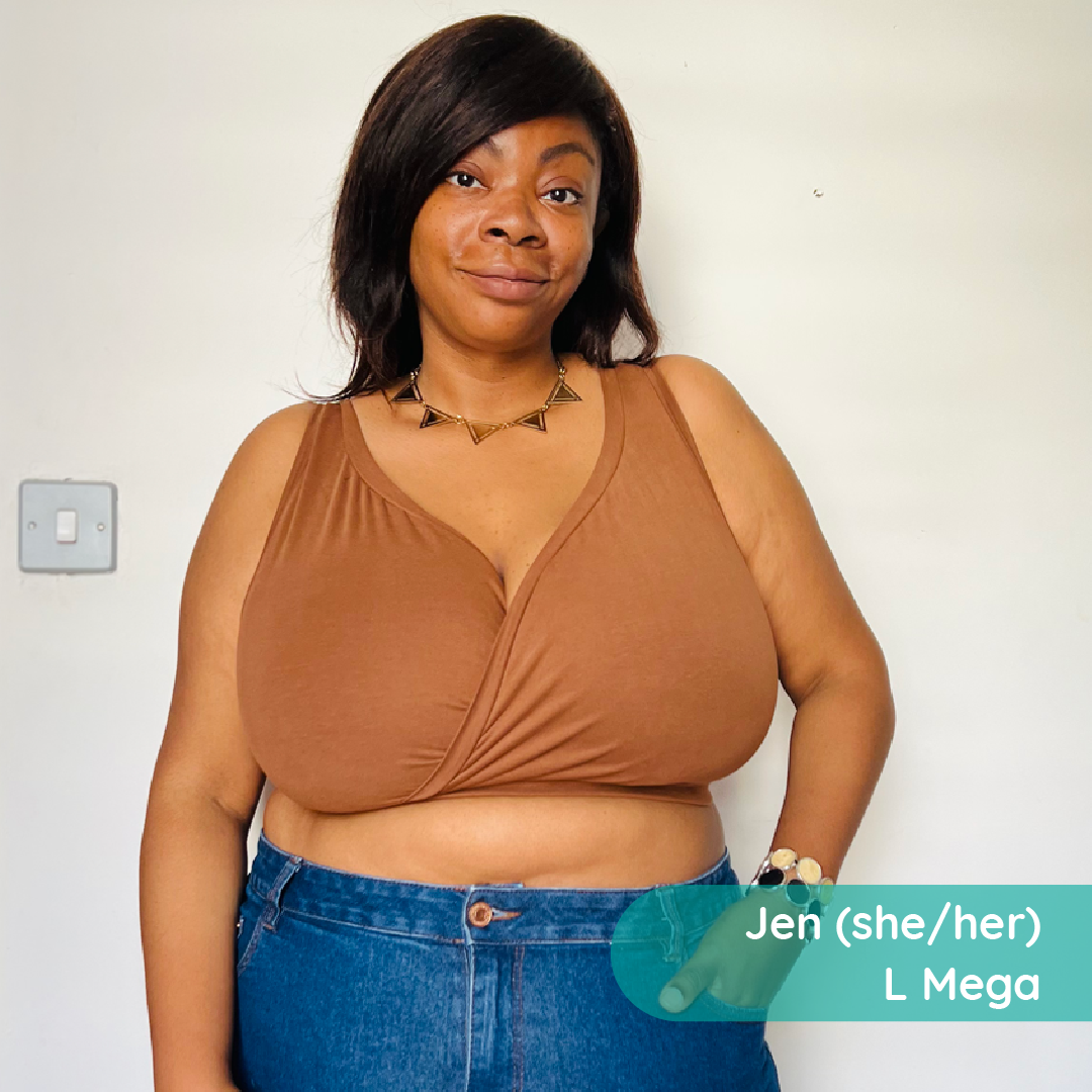 Jen is posing in a brown nude bra