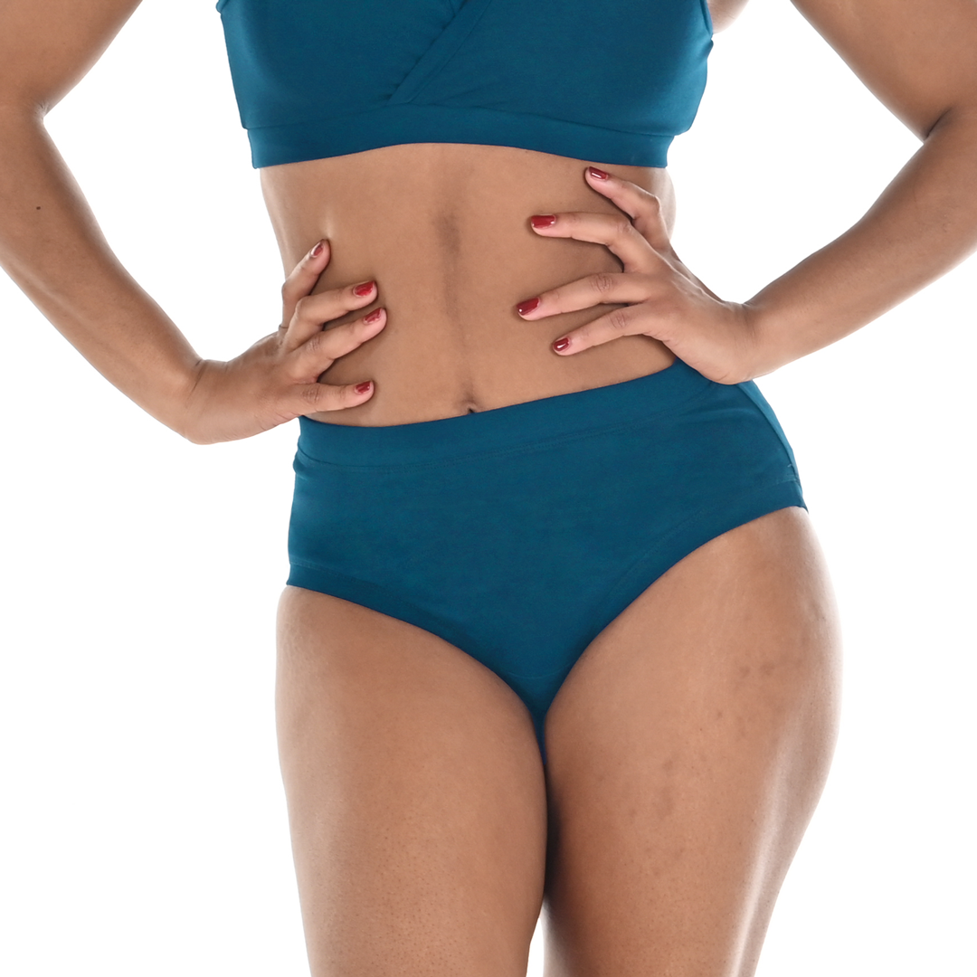 Close crop of model wearing 100% cotton jersey high rise briefs