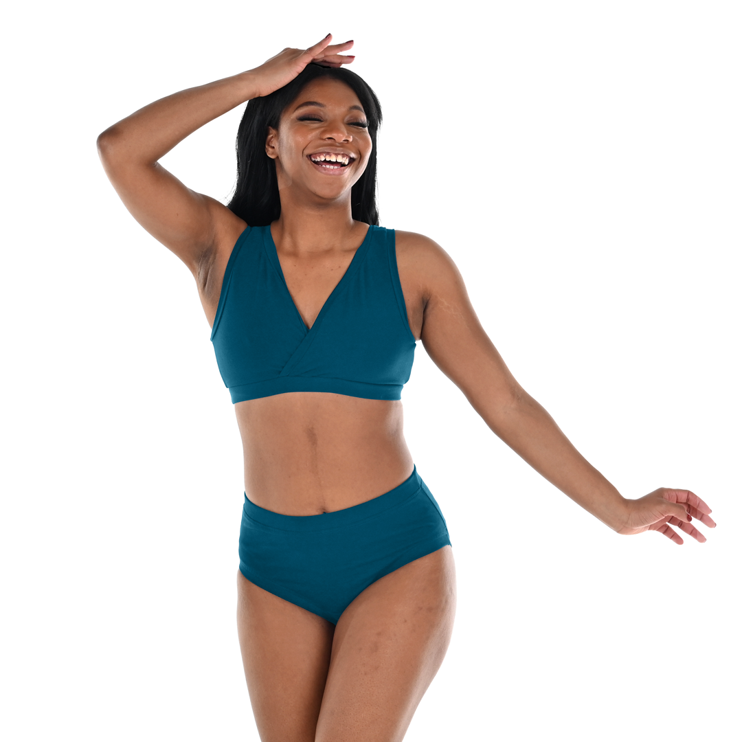 Precious is wearing a teal cotton underwear set