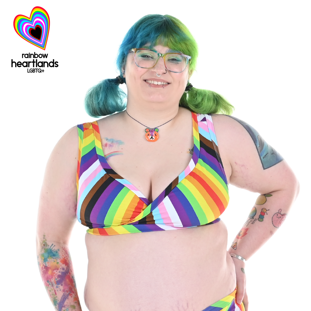 Autumn is wearing a Pride rainbow bra