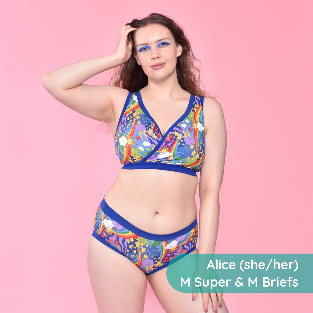 Alice is wearing a colourful retro rainbow bra and briefs