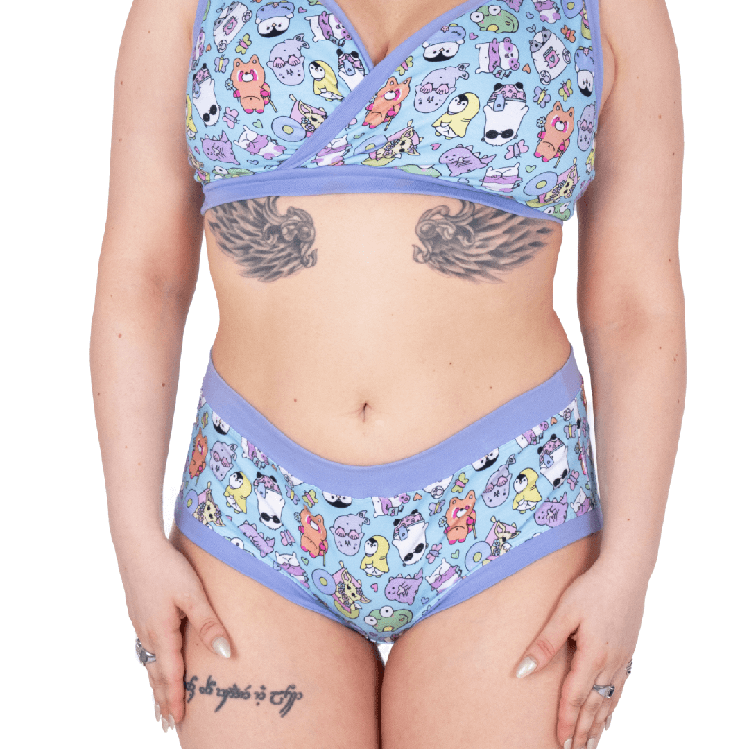 Close crop of Ola wearing sugar and sloth illustrated underwear set