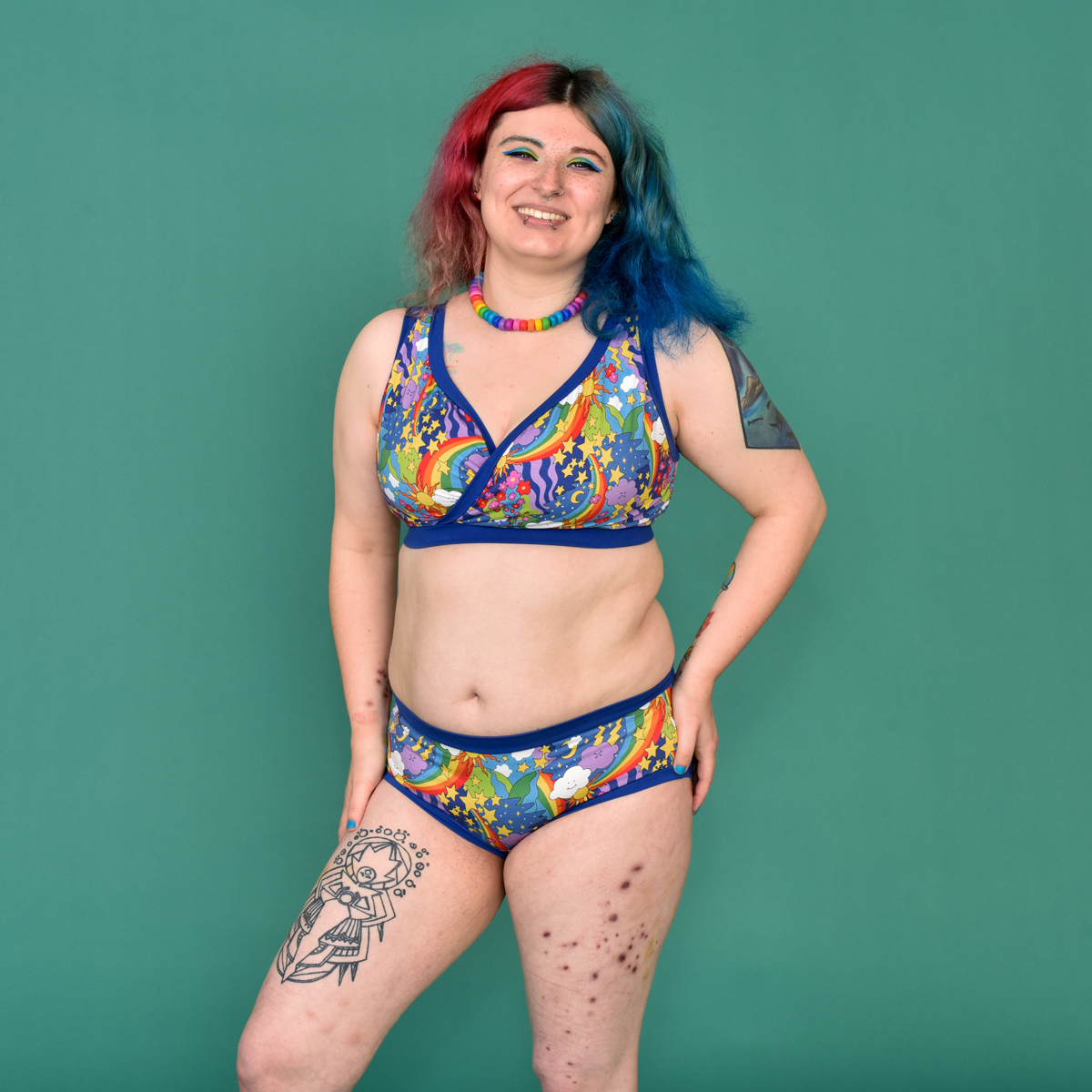 Autumn is wearing a colourful Retro Rainbow underwear set