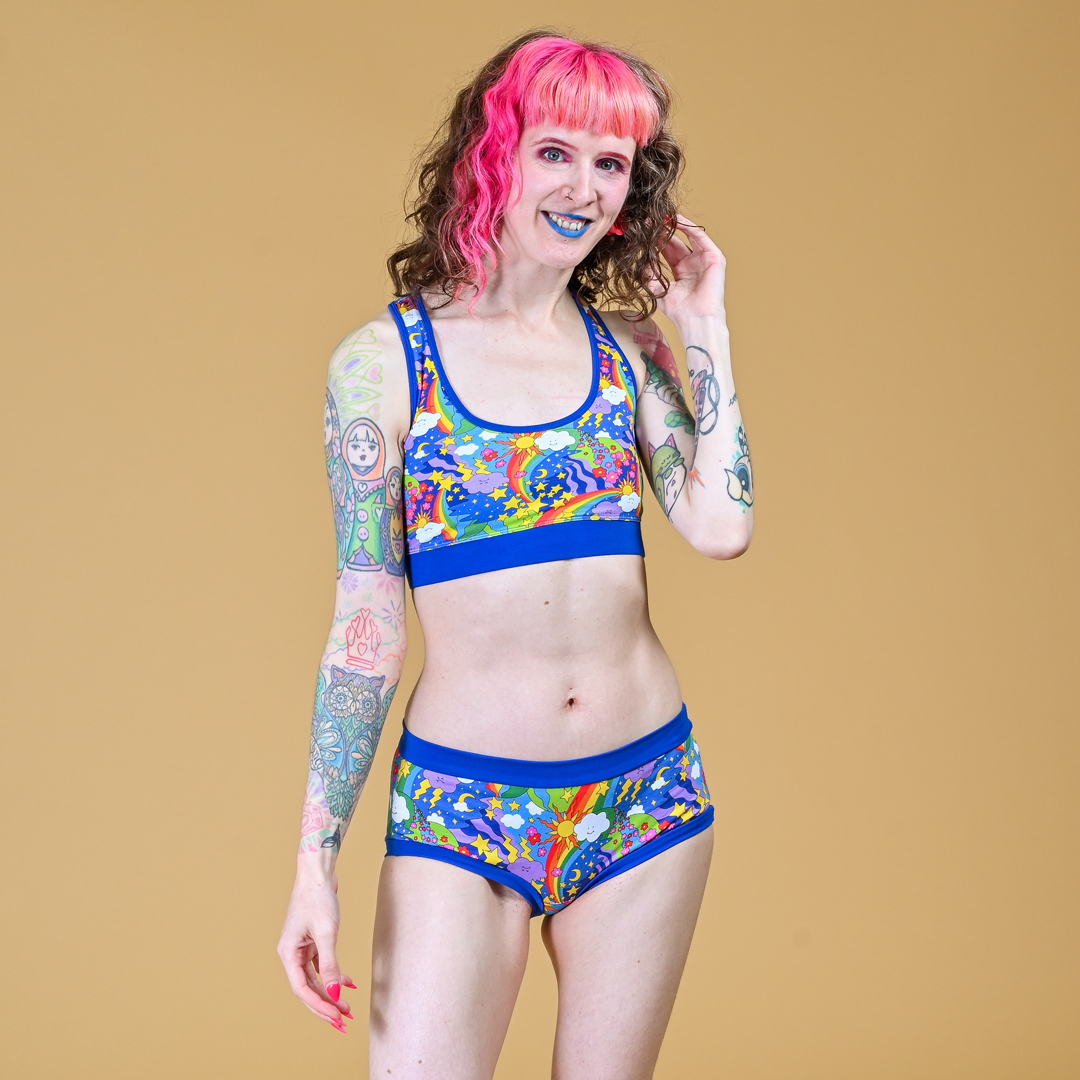 Tracy is wearing cotton rainbow briefs and bralette