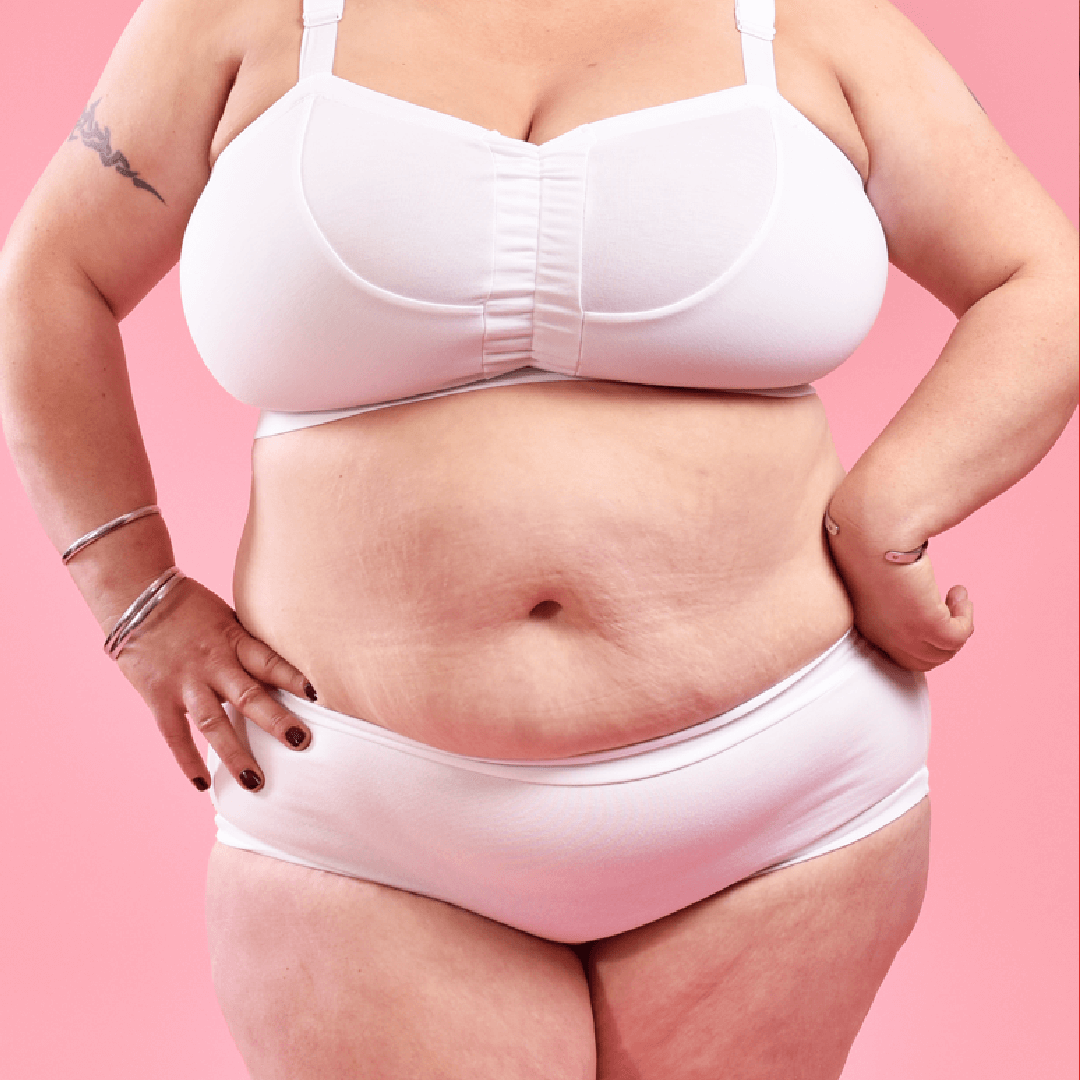 Close crop of Annie wearing a white flexi size bra and briefs