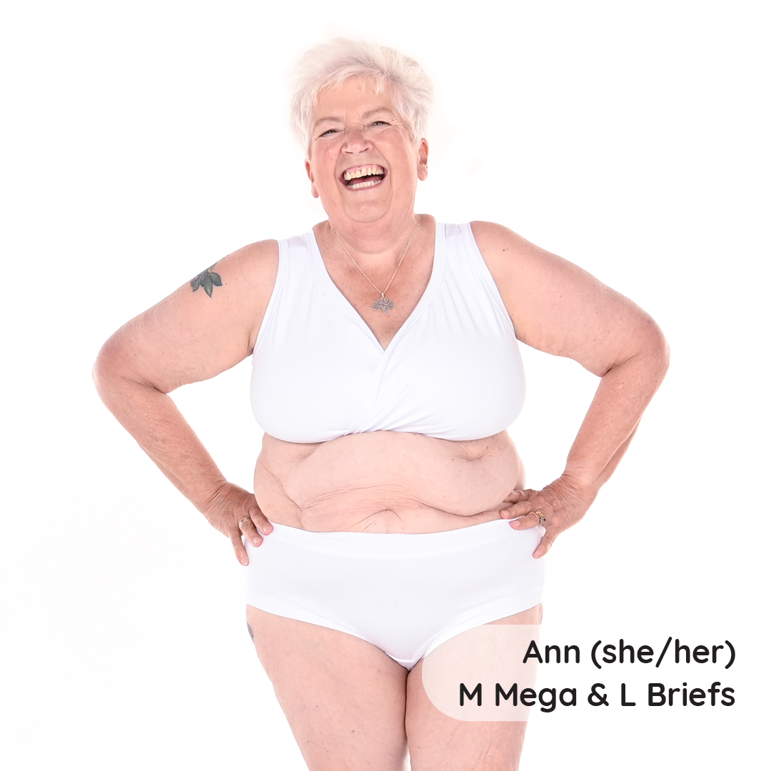 Ann is wearing a white non wired bra and briefs