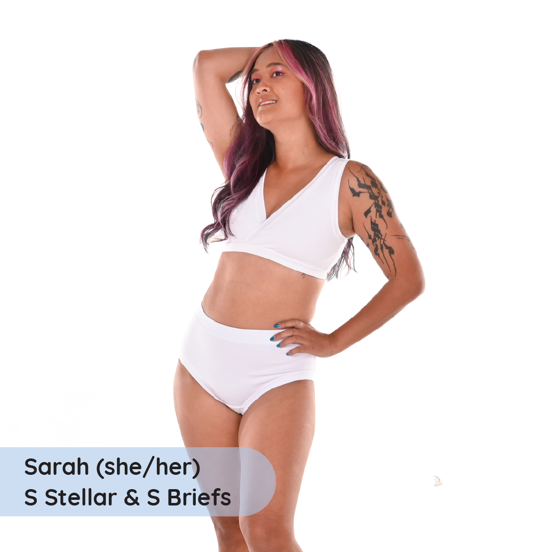 Sarah is wearing a non wired white bra and cotton briefs