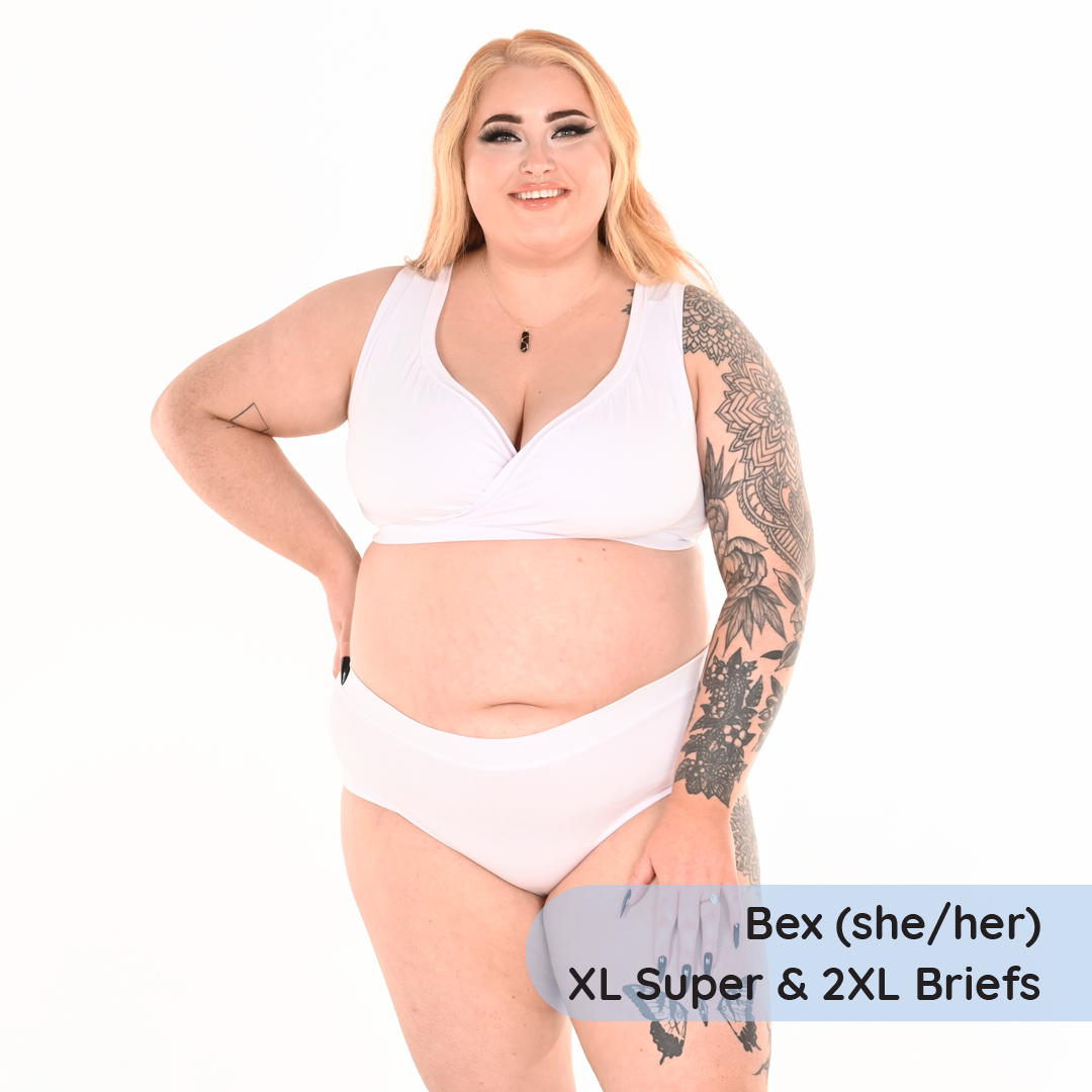 Bexs is wearing a supportive white cotton bra and high rise briefs