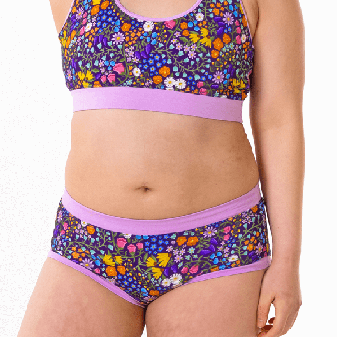 Close crop of Jacqueline wearing wildflowers bralette and briefs