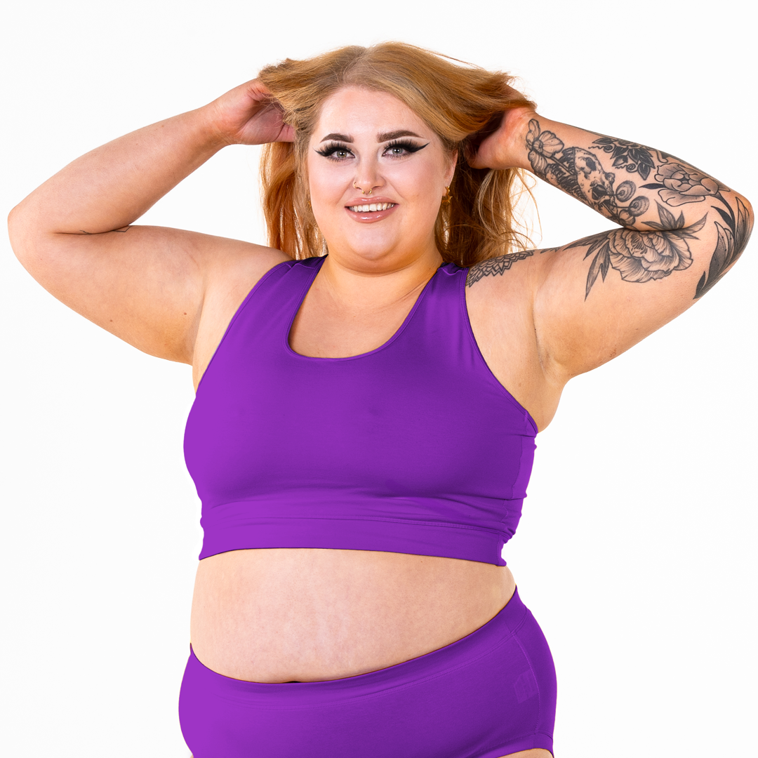 Bex is wearing an Iris purple bralette and briefs