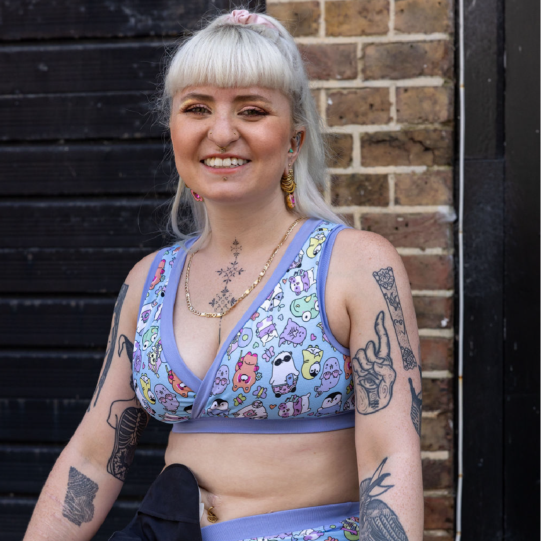 Jess is wearing an Original bra and briefs in an outside courtyard