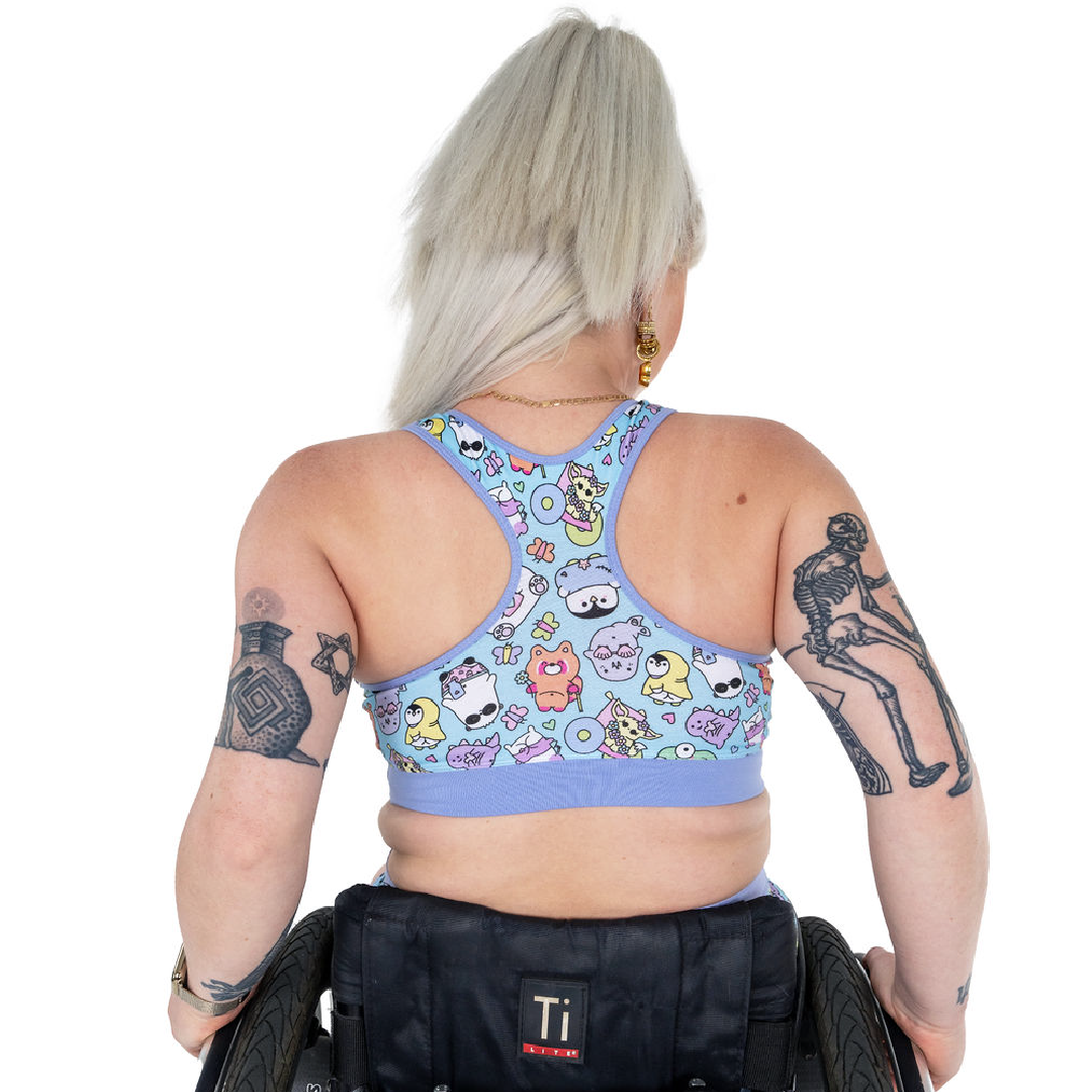 Back view of Jess wearing a racerback sugar and sloth bralette