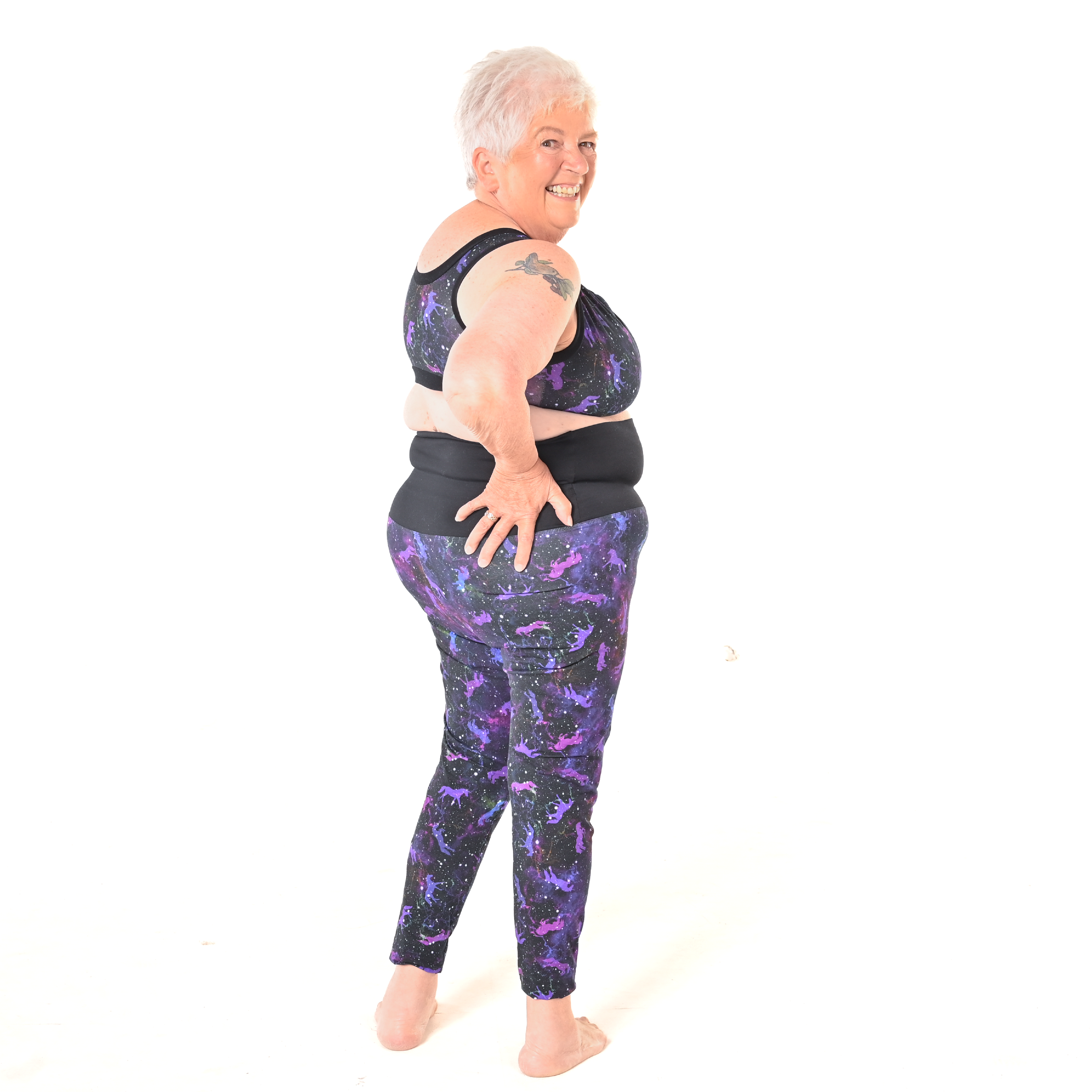 Ann looking over her shoulder wearing Universe high waist cotton leggings