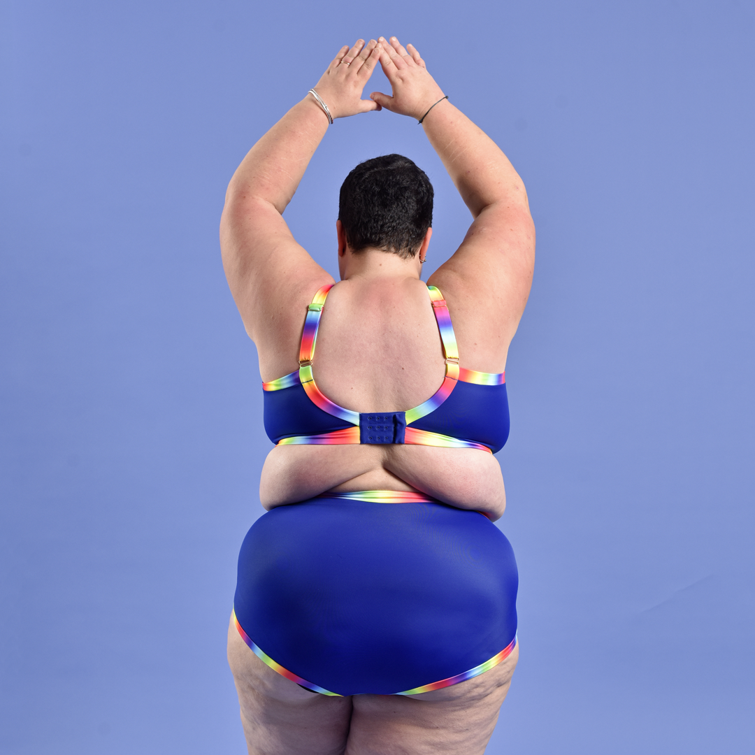 Back view of Estelle in blue rainbow non-wired bikini