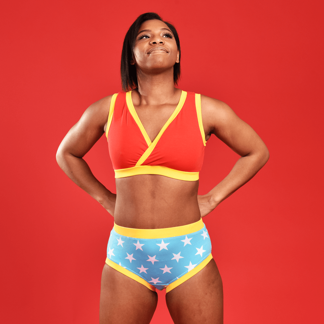 Precious is wearing Power wonderwoman bra and high rise briefs