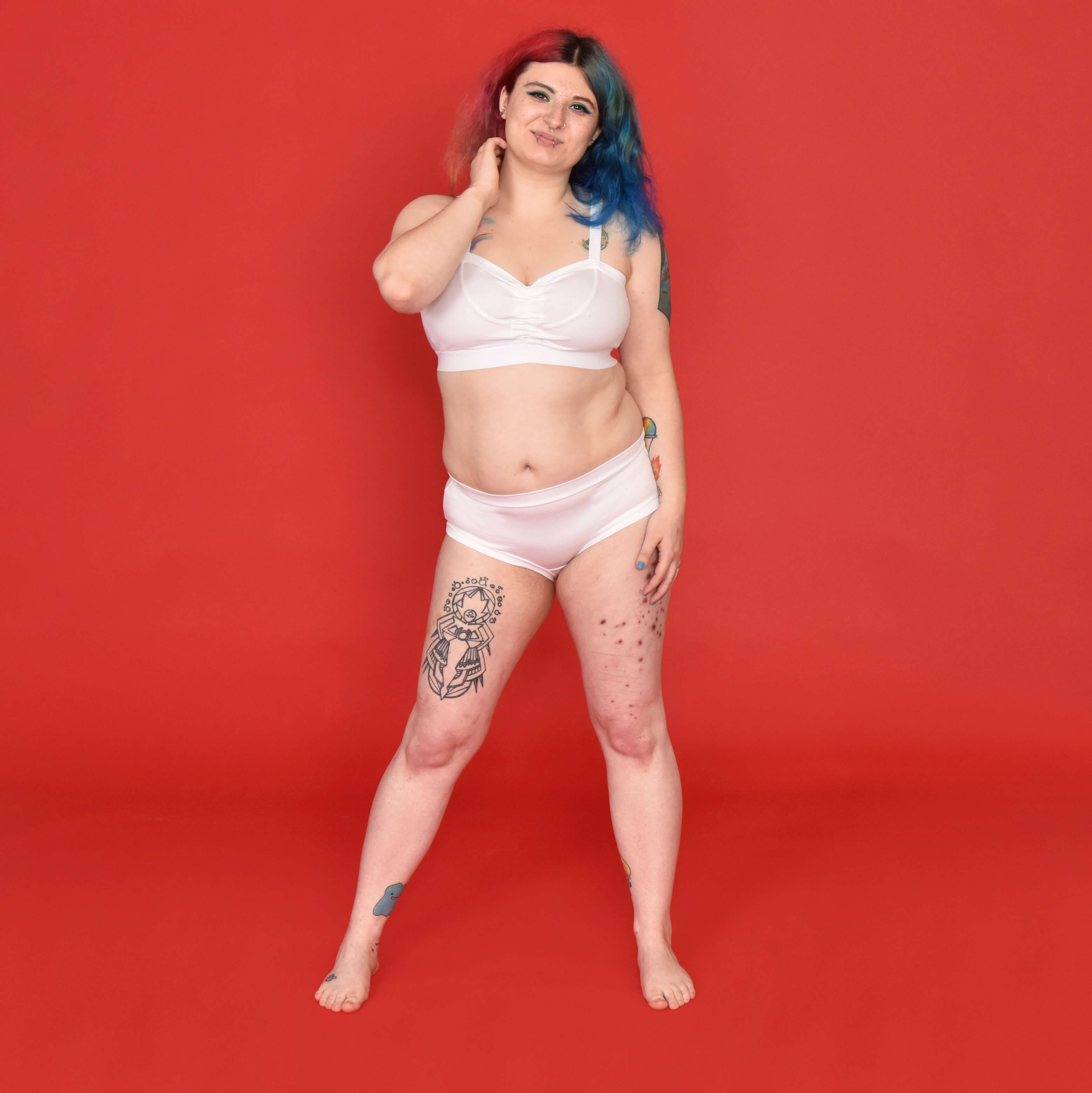 Autumn is wearing a white cotton non-wired underwear set