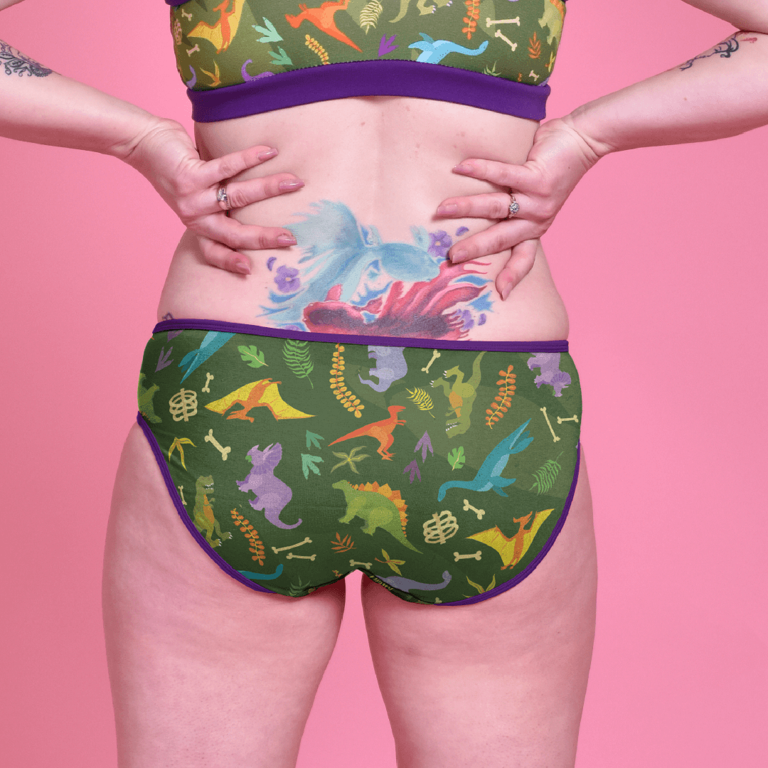 Jenni is wearing low rise cotton dinosaur briefs.  Back shot